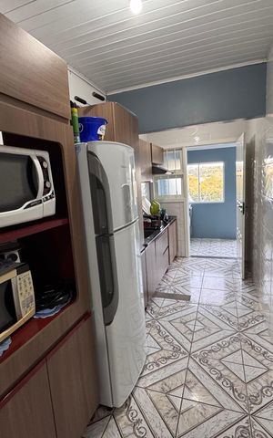 Casa à venda com 78m², 2 quartos e 2 vagas Casa à venda com 78m², 2 quartos e 2 vagasCozinha