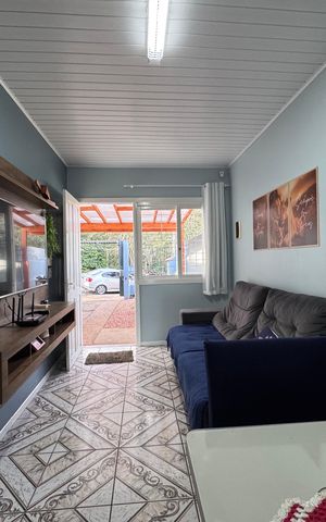 Casa à venda com 78m², 2 quartos e 2 vagas Casa à venda com 78m², 2 quartos e 2 vagasSala