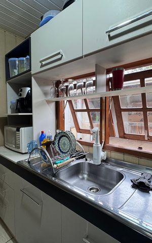 Casa à venda com 80m², 2 quartos e 3 vagas Casa à venda com 80m², 2 quartos e 3 vagasCozinha