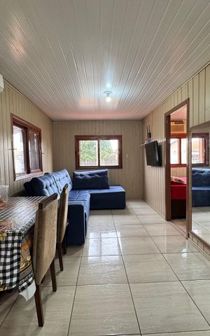 Casa à venda com 80m², 2 quartos e 3 vagas Casa à venda com 80m², 2 quartos e 3 vagasSala