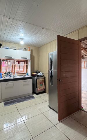 Casa à venda com 80m², 2 quartos e 3 vagas Casa à venda com 80m², 2 quartos e 3 vagasCozinha