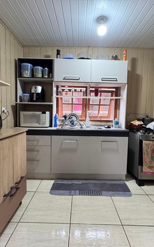 Casa à venda com 80m², 2 quartos e 3 vagas Casa à venda com 80m², 2 quartos e 3 vagasCozinha
