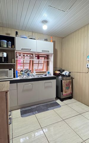 Casa à venda com 80m², 2 quartos e 3 vagas Casa à venda com 80m², 2 quartos e 3 vagasCozinha