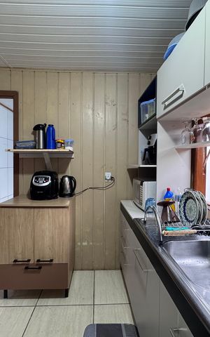 Casa à venda com 80m², 2 quartos e 3 vagas Casa à venda com 80m², 2 quartos e 3 vagasCozinha