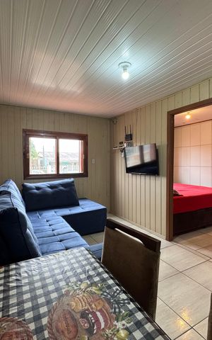 Casa à venda com 80m², 2 quartos e 3 vagas Casa à venda com 80m², 2 quartos e 3 vagasSala