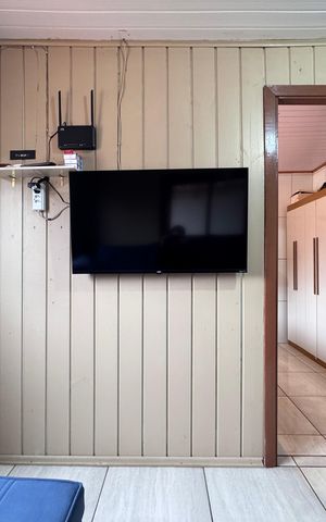 Casa à venda com 80m², 2 quartos e 3 vagas Casa à venda com 80m², 2 quartos e 3 vagasSala