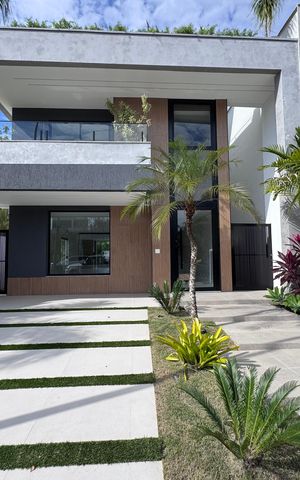 Casa de condomínio à venda com 420m², 4 quartos e 4 vagas Casa de condomínio à venda com 420m², 4 quartos e 4 vagasFachada