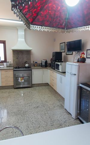 Casa de condomínio para alugar com 283m², 3 quartos e 10 vagasCozinha