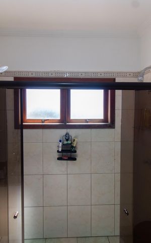 Casa de condomínio para alugar com 283m², 3 quartos e 10 vagasBanheiro da Suíte 3