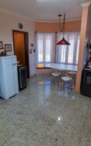 Casa de condomínio para alugar com 283m², 3 quartos e 10 vagasCozinha