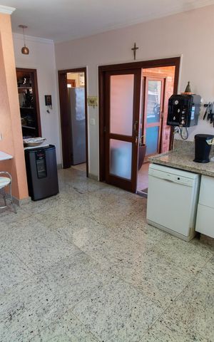 Casa de condomínio para alugar com 283m², 3 quartos e 10 vagasCozinha