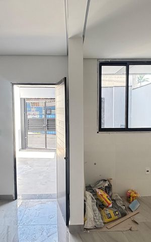 Casa à venda com 70m², 2 quartos e 2 vagas Casa à venda com 70m², 2 quartos e 2 vagasSala/Cozinha