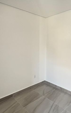 Casa à venda com 70m², 2 quartos e 2 vagas Casa à venda com 70m², 2 quartos e 2 vagasSuite 1