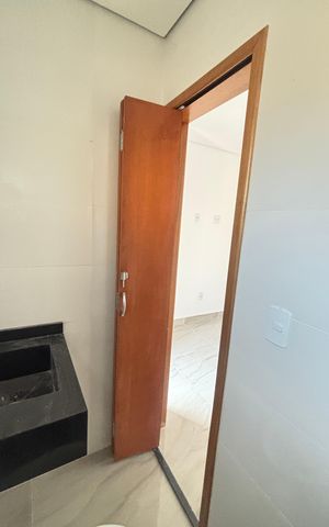 Casa à venda com 70m², 2 quartos e 2 vagas Casa à venda com 70m², 2 quartos e 2 vagasBanheiro da Suíte 2