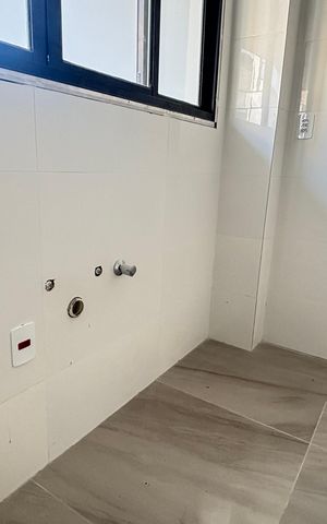 Casa à venda com 70m², 2 quartos e 2 vagas Casa à venda com 70m², 2 quartos e 2 vagasSala/Cozinha