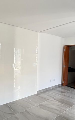 Casa à venda com 70m², 2 quartos e 2 vagas Casa à venda com 70m², 2 quartos e 2 vagasSala/Cozinha