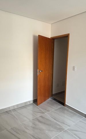Casa à venda com 70m², 2 quartos e 2 vagas Casa à venda com 70m², 2 quartos e 2 vagasSuite 1