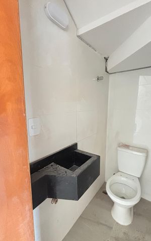 Casa à venda com 70m², 2 quartos e 2 vagas Casa à venda com 70m², 2 quartos e 2 vagasLavabo