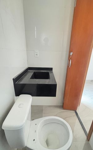 Casa à venda com 70m², 2 quartos e 2 vagas Casa à venda com 70m², 2 quartos e 2 vagasBanheiro da Suíte 2