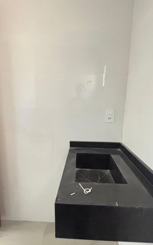Casa à venda com 70m², 2 quartos e 2 vagas Casa à venda com 70m², 2 quartos e 2 vagasBanheiro da Suíte 1