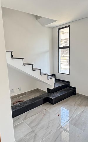 Casa à venda com 70m², 2 quartos e 2 vagas Casa à venda com 70m², 2 quartos e 2 vagasSala/Cozinha
