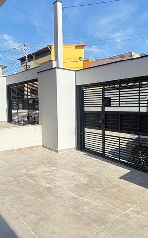 Casa à venda com 70m², 2 quartos e 2 vagas Casa à venda com 70m², 2 quartos e 2 vagasGaragem