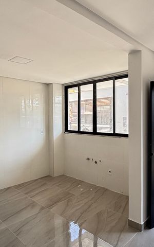 Casa à venda com 70m², 2 quartos e 2 vagas Casa à venda com 70m², 2 quartos e 2 vagasSala