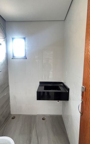 Casa à venda com 70m², 2 quartos e 2 vagas Casa à venda com 70m², 2 quartos e 2 vagasBanheiro da Suíte 2