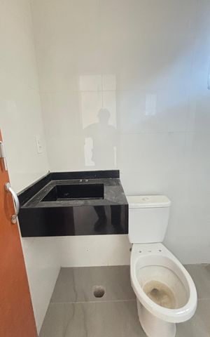 Casa à venda com 70m², 2 quartos e 2 vagas Casa à venda com 70m², 2 quartos e 2 vagasBanheiro da Suíte 1