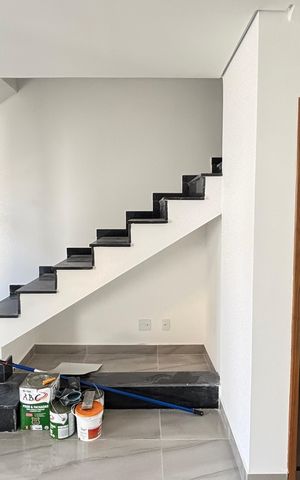 Casa à venda com 70m², 2 quartos e 2 vagas Casa à venda com 70m², 2 quartos e 2 vagasCozinha