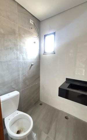 Casa à venda com 70m², 2 quartos e 2 vagas Casa à venda com 70m², 2 quartos e 2 vagasBanheiro da Suíte 2