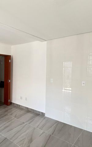 Casa à venda com 70m², 2 quartos e 2 vagas Casa à venda com 70m², 2 quartos e 2 vagasSala