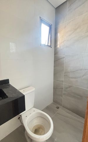Casa à venda com 70m², 2 quartos e 2 vagas Casa à venda com 70m², 2 quartos e 2 vagasBanheiro da Suíte 1