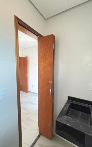Casa à venda com 70m², 2 quartos e 2 vagas Casa à venda com 70m², 2 quartos e 2 vagasBanheiro da Suíte 1