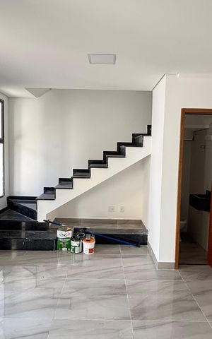 Casa à venda com 70m², 2 quartos e 2 vagas Casa à venda com 70m², 2 quartos e 2 vagasSala