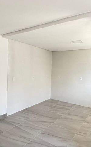 Casa à venda com 70m², 2 quartos e 2 vagas Casa à venda com 70m², 2 quartos e 2 vagasSala