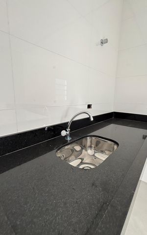 Casa à venda com 95m², 3 quartos e 2 vagas Casa à venda com 95m², 3 quartos e 2 vagasCozinha