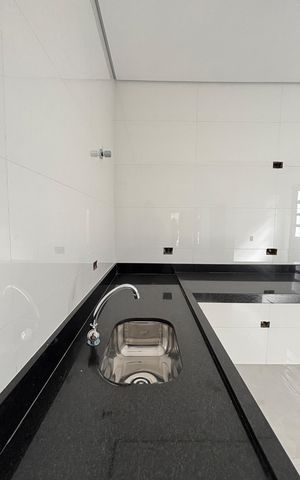 Casa à venda com 95m², 3 quartos e 2 vagas Casa à venda com 95m², 3 quartos e 2 vagasCozinha