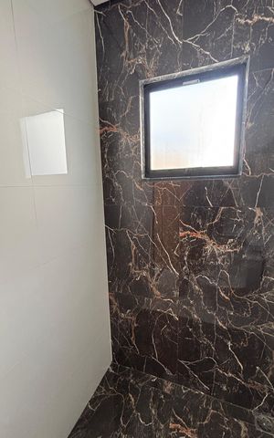 Casa à venda com 95m², 3 quartos e 2 vagas Casa à venda com 95m², 3 quartos e 2 vagasBanheiro da Suíte