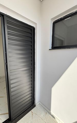 Casa à venda com 95m², 3 quartos e 2 vagas Casa à venda com 95m², 3 quartos e 2 vagasQuarto 1 Varanda