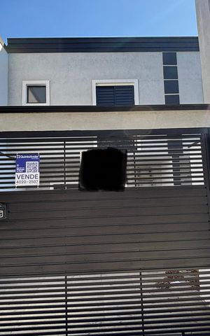 Casa à venda com 95m², 3 quartos e 2 vagas Casa à venda com 95m², 3 quartos e 2 vagasFachada/Placa