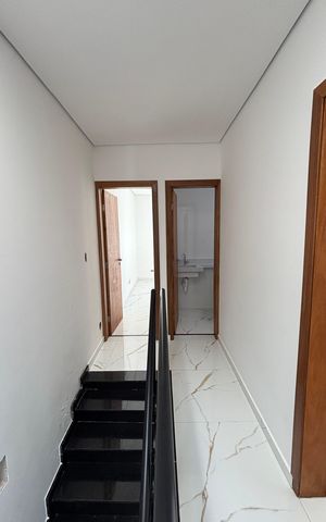 Casa à venda com 95m², 3 quartos e 2 vagas Casa à venda com 95m², 3 quartos e 2 vagasCorredor