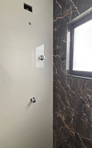 Casa à venda com 95m², 3 quartos e 2 vagas Casa à venda com 95m², 3 quartos e 2 vagasBanheiro