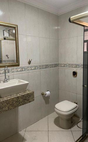 Casa à venda com 264m², 4 quartos e 3 vagasBanheiro 1