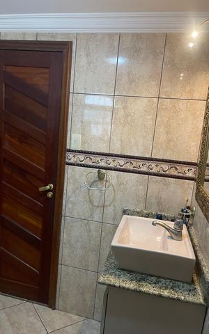 Casa à venda com 264m², 4 quartos e 3 vagasBanheiro 2