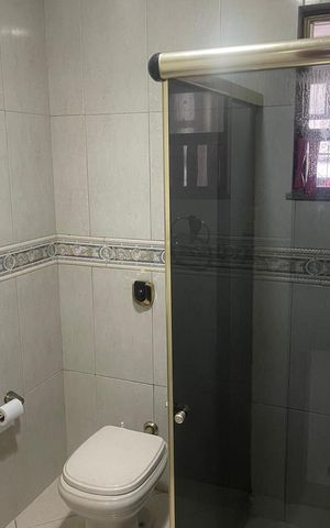 Casa à venda com 264m², 4 quartos e 3 vagasBanheiro 1