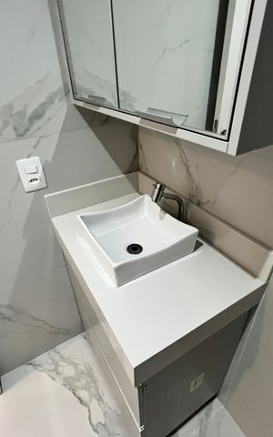 Casa de condomínio à venda com 124m², 3 quartos e 2 vagasBanheiro Social