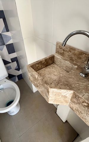 Casa de condomínio à venda com 124m², 3 quartos e 2 vagasÁrea comum - Banheiro