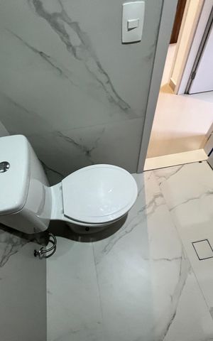 Casa de condomínio à venda com 124m², 3 quartos e 2 vagasBanheiro Social