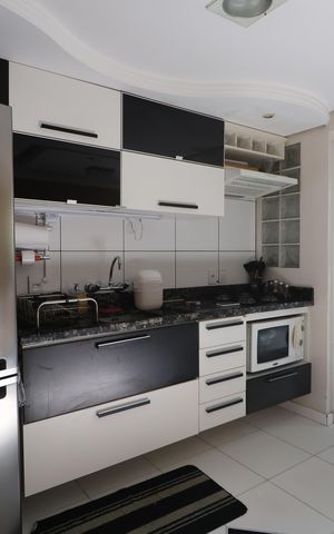 Casa de condomínio à venda com 80m², 2 quartos e 2 vagasCozinha